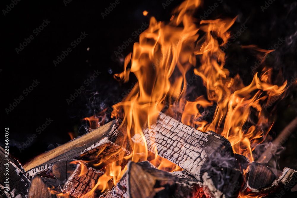 Flaming Logs, fire flames background. Stock Photo | Adobe Stock
