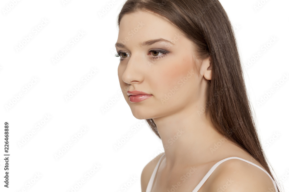 Portrait of young beautiful woman with makeup on white backgeound Portrait of young beautiful woman with makeup on white backgeound