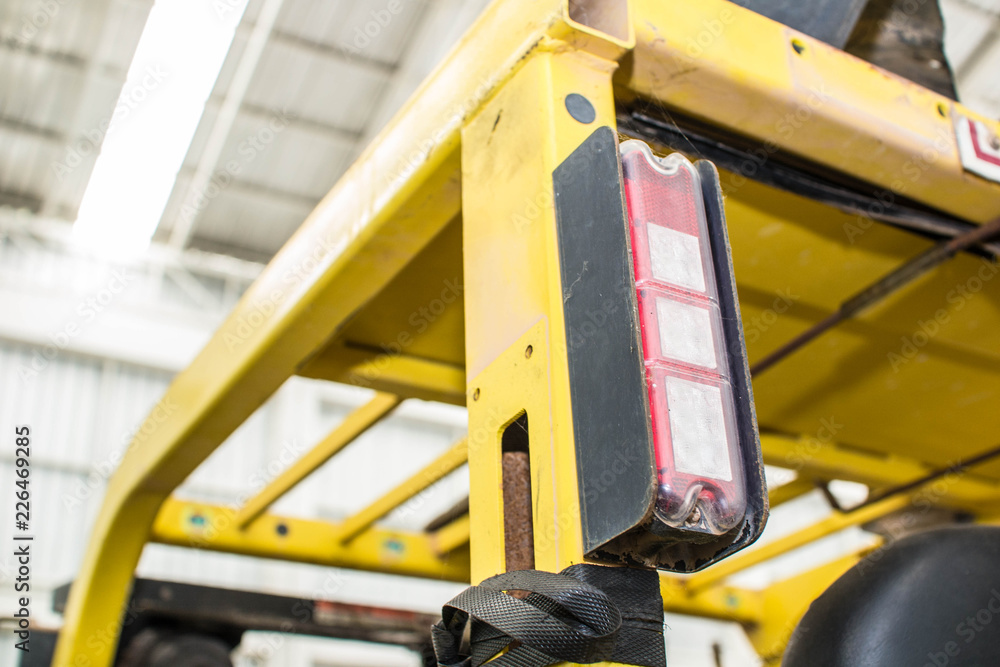 Emergency warning light, attached to a forklift truck. Emergency warning light, attached to a forklift truck.