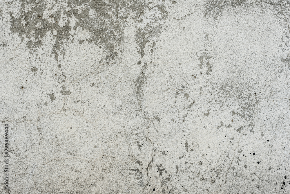 Wall fragment with scratches and cracks. It can be used as a background Wall fragment with scratches and cracks. It can be used as a background