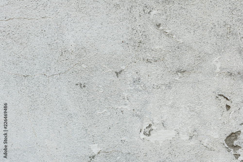 Wall fragment with scratches and cracks. It can be used as a background Wall fragment with scratches and cracks. It can be used as a background