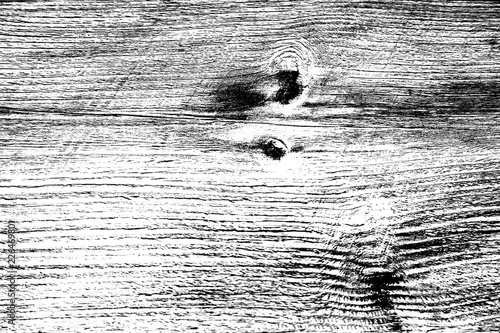 Black and white high contrast wooden texture, lengthwise cut with knots and vertical scratches photo