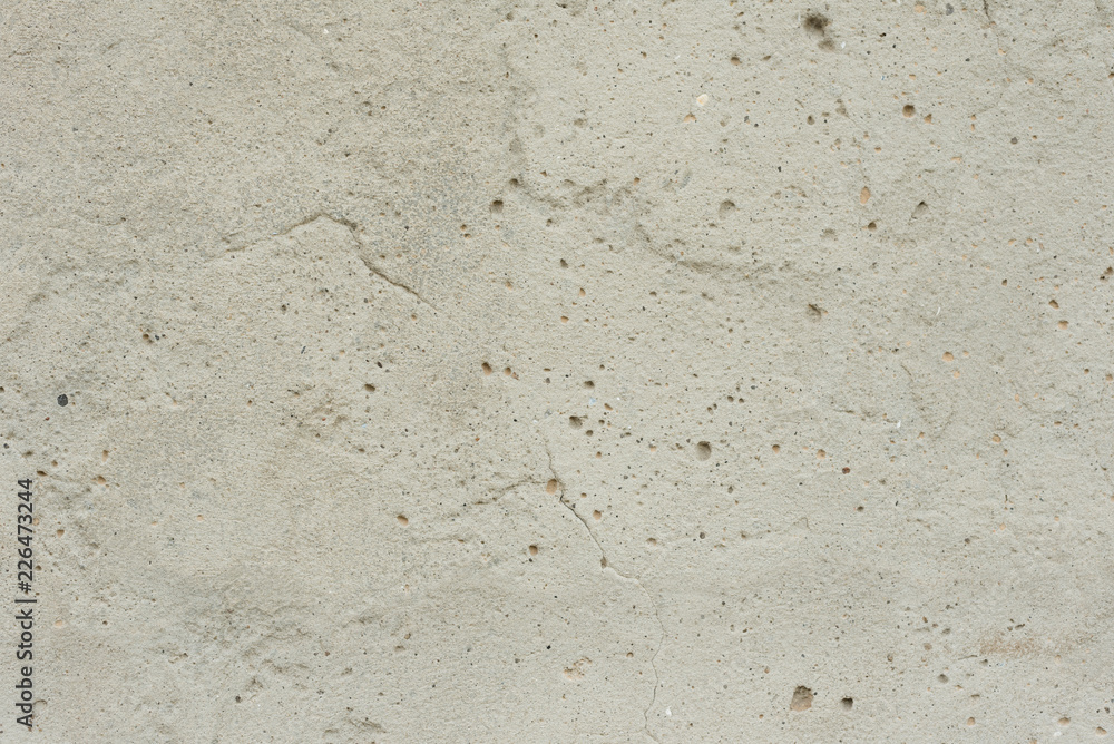 Wall fragment with scratches and cracks. It can be used as a background Wall fragment with scratches and cracks. It can be used as a background