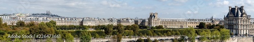 Large panoramic view of Paris from Musee d'Orsay rooftop with the Tuileries Garden, Palais royal, Opera Garnier, Sacre-Coeur and Montmartre hill