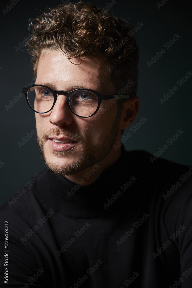Good looking guy in glasses, looking away Good looking guy in glasses, looking away