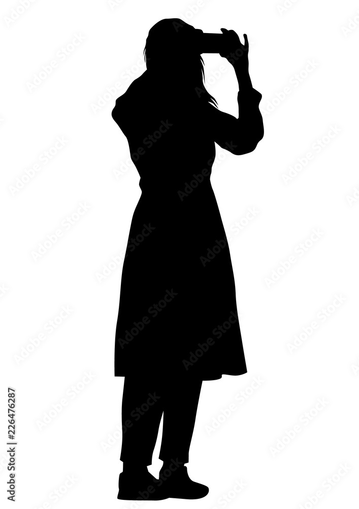 Young woman with phone on a white background