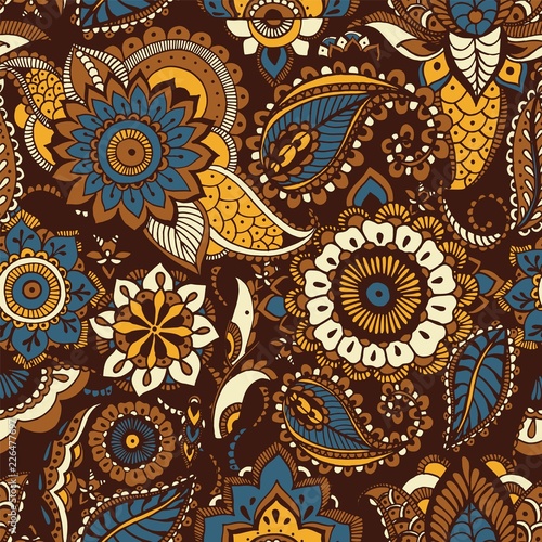 Oriental seamless pattern with ethnic buta motifs and Persian floral mehndi elements on brown background. Motley decorative vector illustration for textile print, wallpaper, wrapping paper, backdrop.