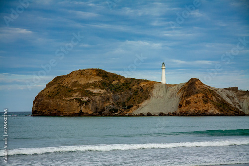 lighthouse on coast of sea