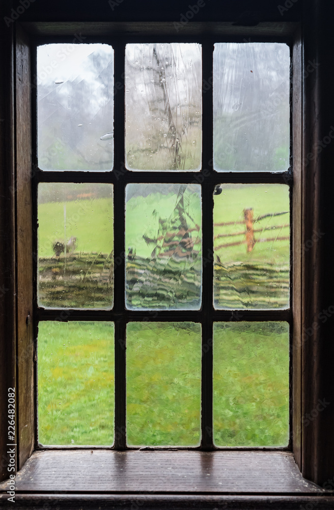 Fototapeta premium The window of an old farmhouse, inside