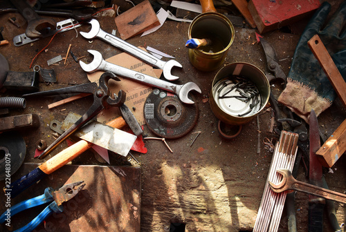 Workshop workbench with tools and work disorder