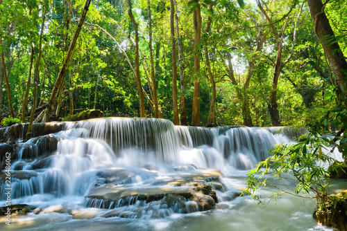 Huai Mae Khamin waterfall at Kanchanaburi , Thailand , beautiful waterfall, forest, waterfall with tree background © waranyu
