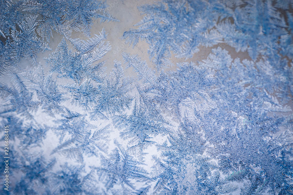 Winter ice pattern on the frozen window. Texture, background for inserting  text. New Year theme. Winter. Cold. Stock Photo | Adobe Stock