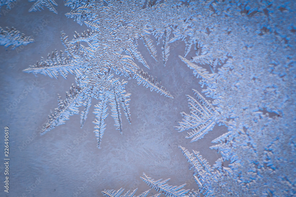 Winter ice pattern on the frozen window. Texture, background for inserting  text. New Year theme. Winter. Cold. Stock Photo | Adobe Stock