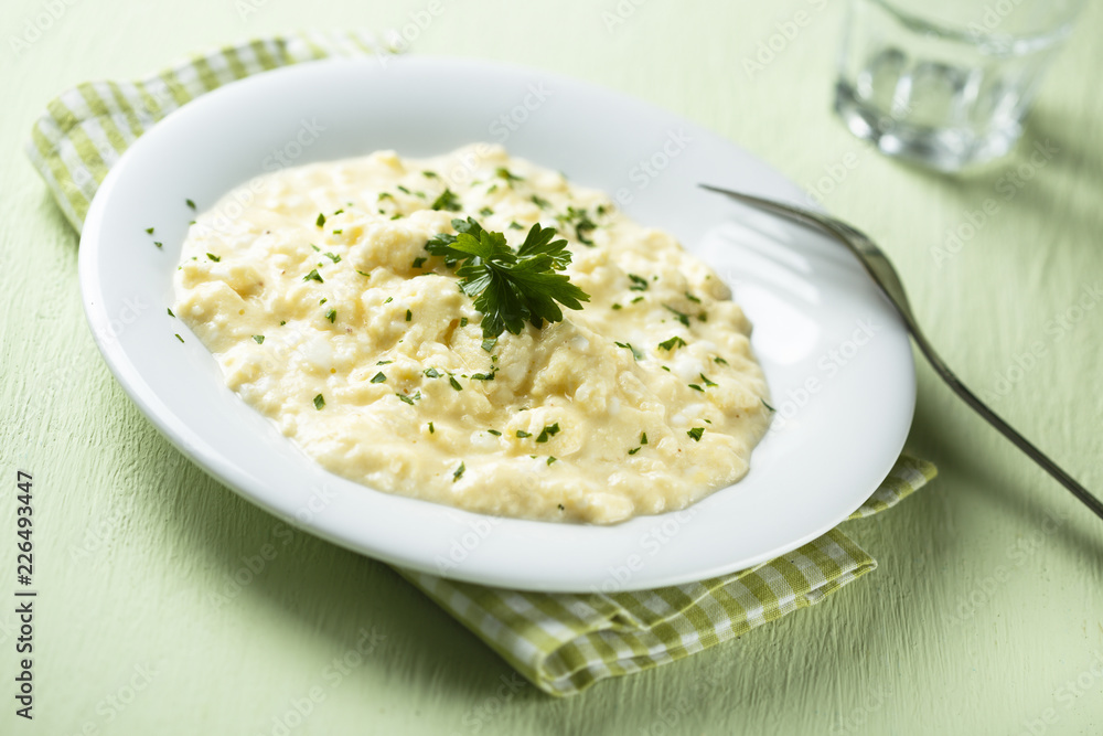 Homemade scrambled eggs with parsley Homemade scrambled eggs with parsley