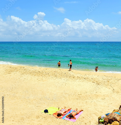 People on Culatra beach, Algarve, southern Portugal
