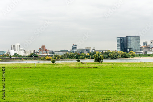 panorama of city with blue sky and clouds on the river
