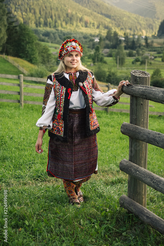 Woman in ethnic and traditional Ukrainian clothes photo