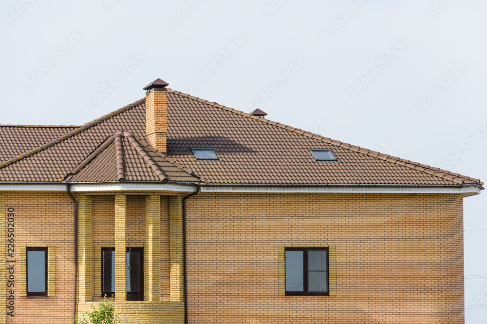 house with a gable roof window