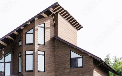 house with a gable roof window