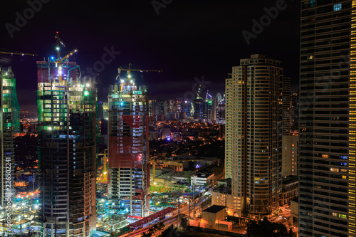 Manila at night. Buildings and cranes. Long Exposure. © Oktawiusz