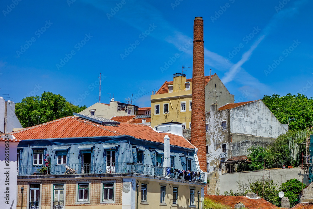 Old buildings and chimney in Lisbon, Portugal