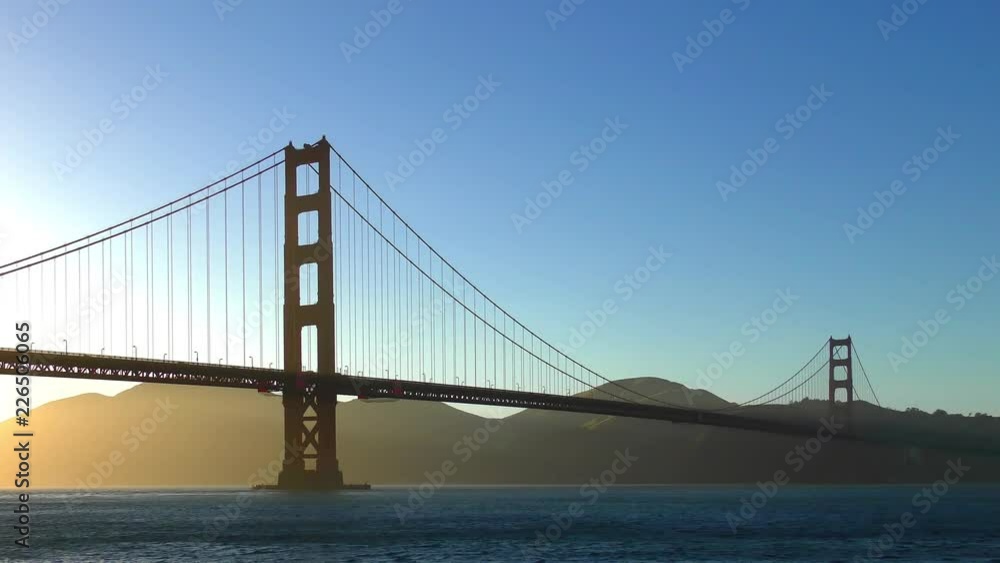 The Golden Gate Bridge at sunset as seen from Chrissy Field, San Francisco, California, USA The Golden Gate Bridge at sunset as seen from Chrissy Field, San Francisco, California, USA