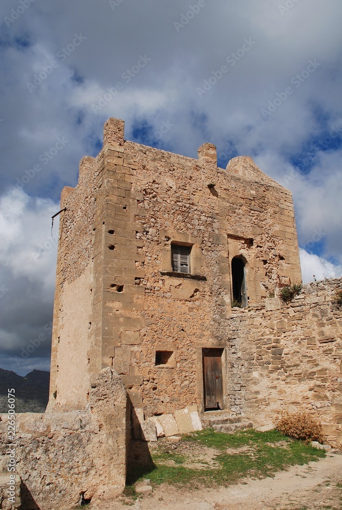 The tower of the monastery and church on the summit of the Puig de Maria at Pollensa on the Spanish island of Majorca. The tower of the monastery and church on the summit of the Puig de Maria at Pollensa on the Spanish island of Majorca.
