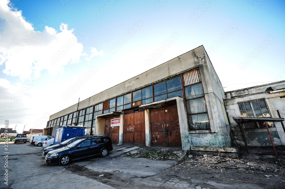 Old warehouse with rusty construction elements.