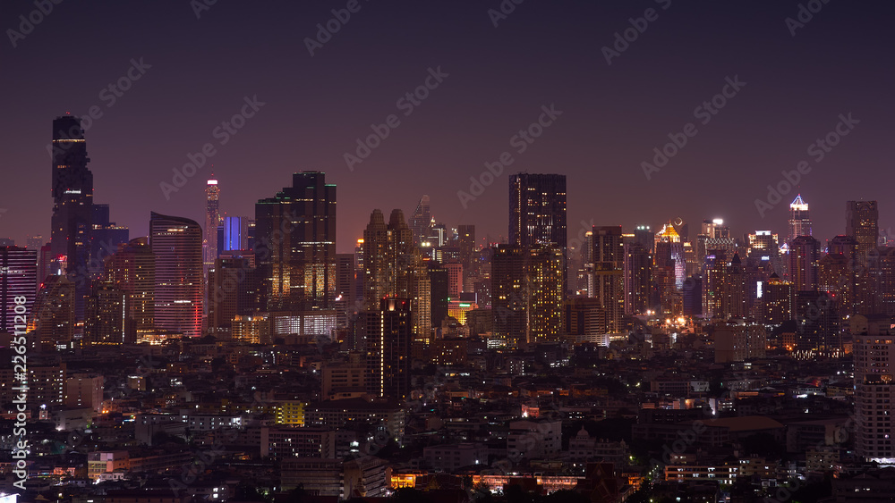 night cityscape lighting up building