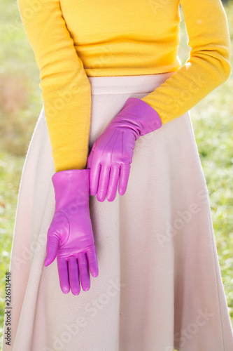 Woman in a pink gloves