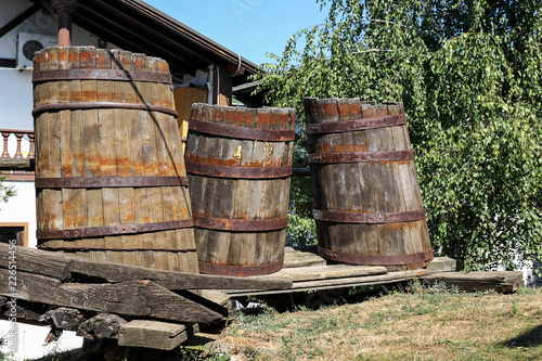 Three old barrels for making wine from grapes