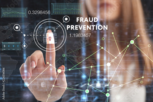 The concept of business, technology, the Internet and the network. A young entrepreneur working on a virtual screen of the future and sees the inscription: Fraud prevention