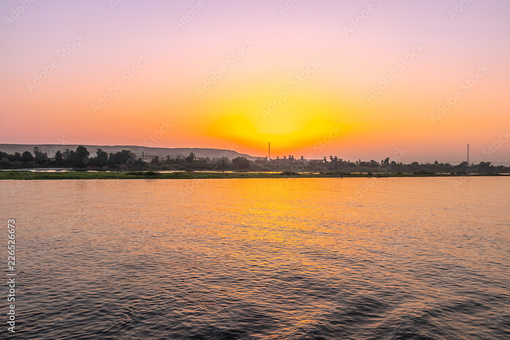 Naklejka premium Sunset over the Nile river in Egypt