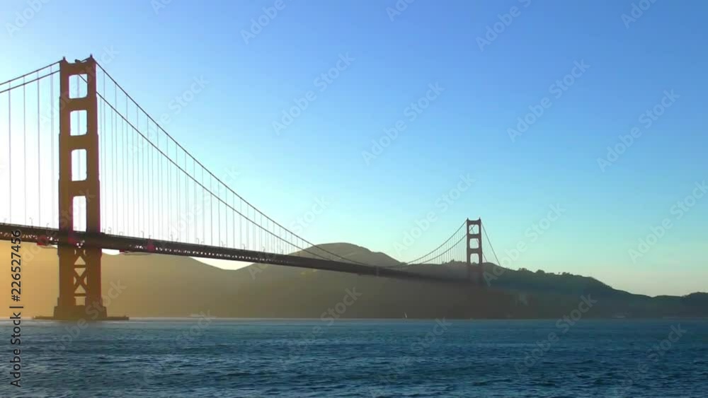The Golden Gate Bridge at sunset as seen from Chrissy Field, San Francisco, California, USA The Golden Gate Bridge at sunset as seen from Chrissy Field, San Francisco, California, USA