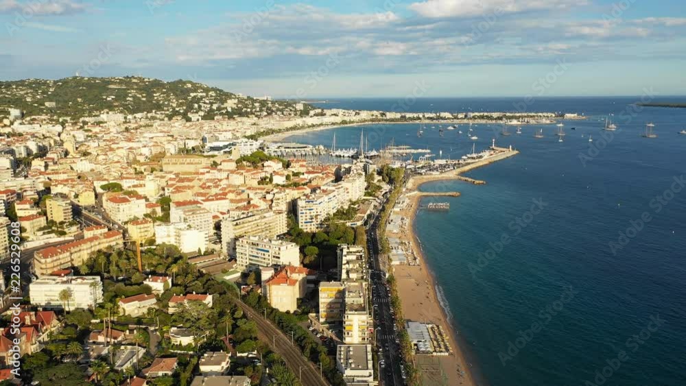 Aerial panoramic view of cityscape of Cannes, famous city on French Riviera during sunset - Mediterranean sea, landscape panorama of France, Europe Aerial panoramic view of cityscape of Cannes, famous city on French Riviera during sunset - Mediterranean sea, landscape panorama of France, Europe