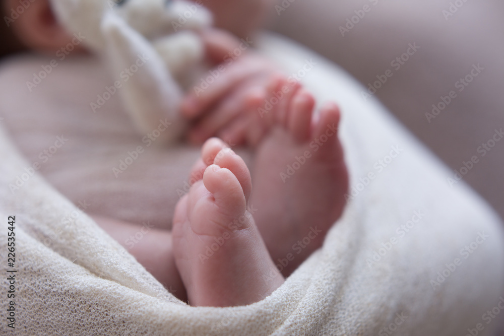 the legs of the newborn baby. the legs of the newborn flaky skin. peel off the skin. peeling skin newborn. newborn child. feet the legs of the newborn baby. the legs of the newborn flaky skin. peel off the skin. peeling skin newborn. newborn child. feet