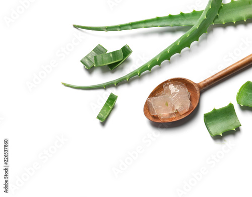 Flat lay composition with aloe vera on white background. Space for text