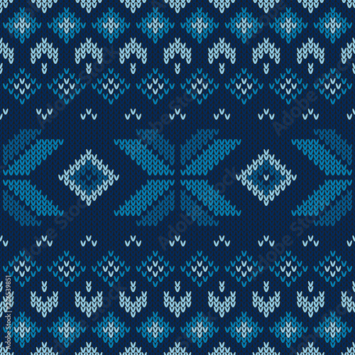 Christmas knitted pattern. Geometric abstract seamless pattern. Design for sweater, scarf, comforter or clothes texture.