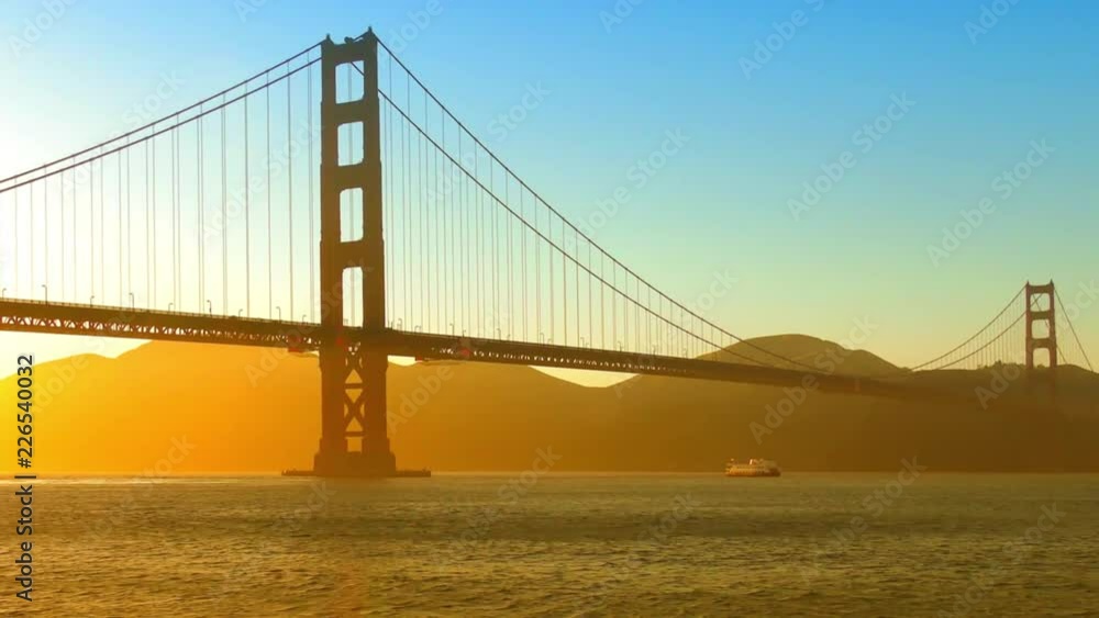 The Golden Gate Bridge at sunset as seen from Chrissy Field, San Francisco, California, USA The Golden Gate Bridge at sunset as seen from Chrissy Field, San Francisco, California, USA