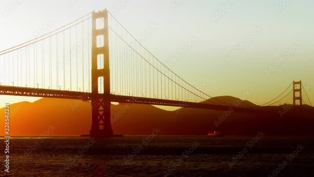 The Golden Gate Bridge at sunset as seen from Chrissy Field, San Francisco, California, USA The Golden Gate Bridge at sunset as seen from Chrissy Field, San Francisco, California, USA