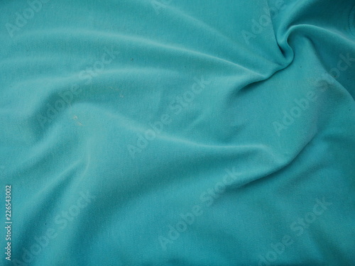 green texture of silk fabric background