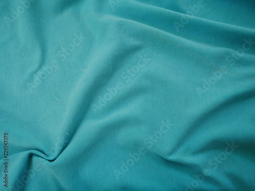 green texture of silk fabric background