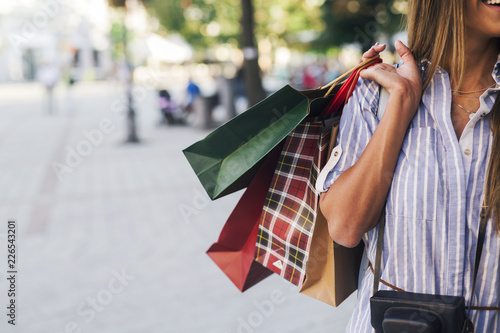 Pretty woman in shopping photo