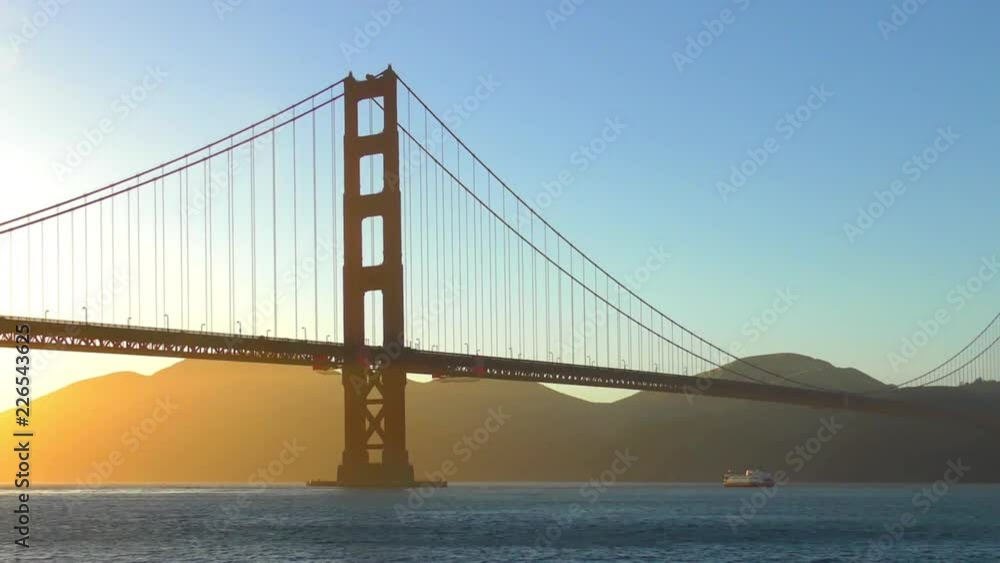 The Golden Gate Bridge at sunset as seen from Chrissy Field, San Francisco, California, USA The Golden Gate Bridge at sunset as seen from Chrissy Field, San Francisco, California, USA