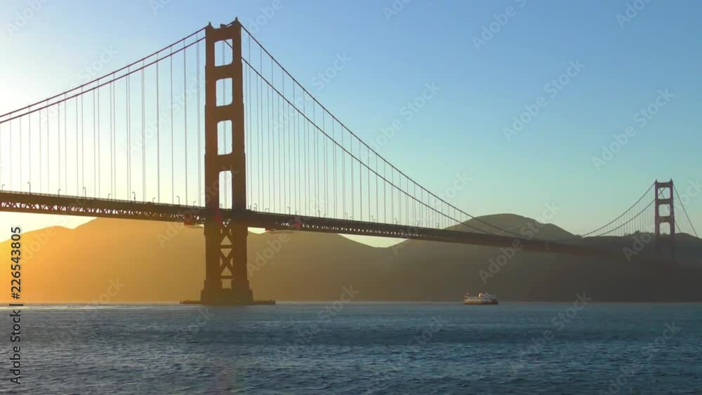 The Golden Gate Bridge at sunset as seen from Chrissy Field, San Francisco, California, USA The Golden Gate Bridge at sunset as seen from Chrissy Field, San Francisco, California, USA