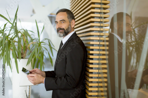 Middle age businessman with...