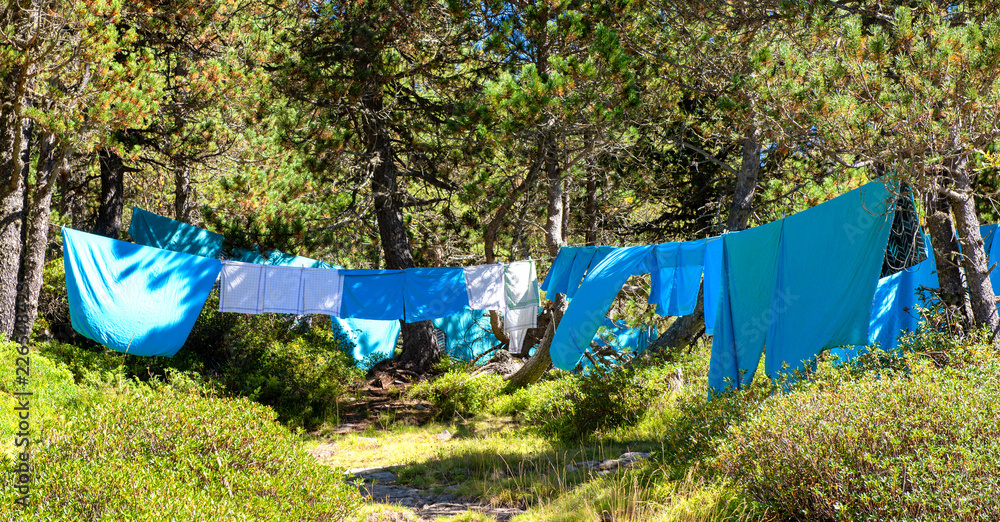 Dry sheets after washing in the sun on wire Dry sheets after washing in the sun on wire