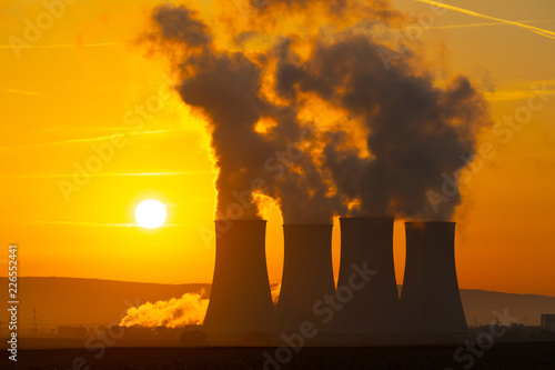 cooling towers of an atomic power plant in the morning sun