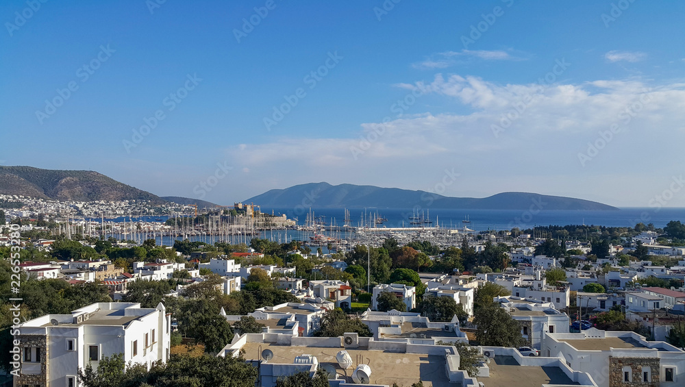 View of Bodrum castle and Marina Harbor in Aegean sea in Turkey.