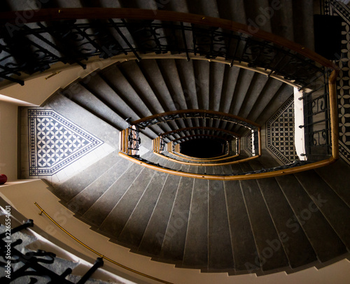 Geometry lines in retro ladder stairs in a house with a dark light